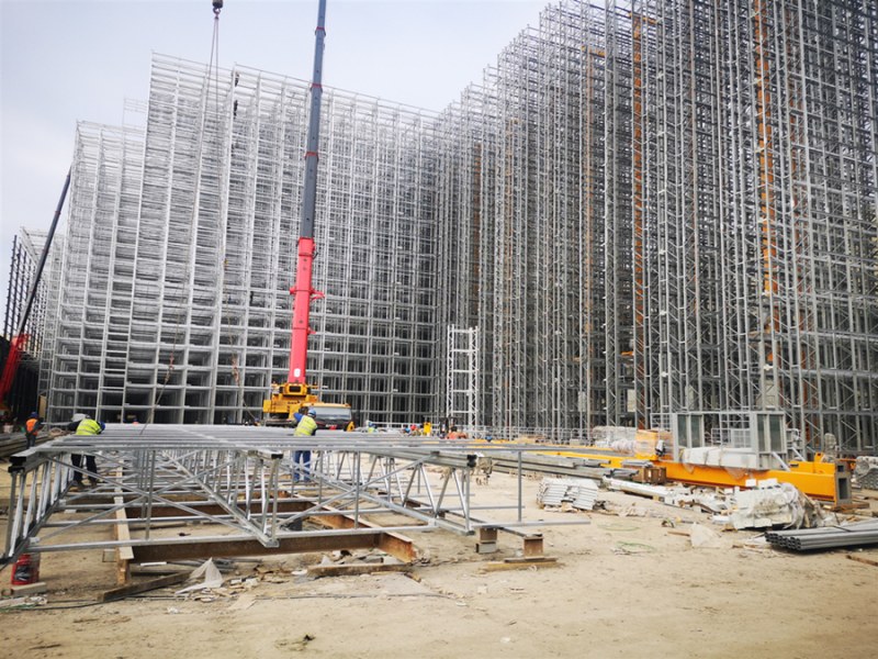 อาคารคลังสินค้าโครงสร้างชั้นวางพร้อมเครนจัดเก็บอัตโนมัติ (Stacker Crane)